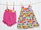 Baby Dress and Bathing Suit on a Clothesline