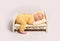 Baby dressed in knitted yellow costume sleeping on crib