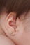 Baby ear with earring