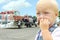 Baby Eating Candy at Parade