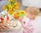 Baby eating Easter cookies