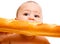 Baby eating French bread