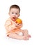 Baby eating peach