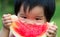 Baby eating watermelon