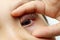 Baby eye pupil iris opened two finger