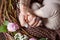 Baby feet in mother hands. Tiny Newborn Baby\'s feet on female Shaped hands closeup.