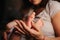 Baby feet in mother hands. Tiny Newborn Baby`s feet on female Shaped hands closeup. Mom and her Child. Happy Family