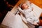 A baby fell asleep on a dressing table in a Church. the ordinance of baptism.