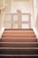 Baby gate view from basement with carpet stairs