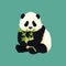 Baby giant panda holding and chewing green bamboo branches and leaves. Black and white chinese bear cub.