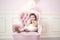 Baby girl beautiful and happy pink interior with vintage chair a