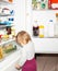 Baby. Girl. Cute. Refrigerator. Child. Kitchen