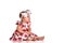 Baby girl in a dress and headband bow sitting barefoot on a white background.