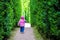 Baby girl left alone newborn walking child alone among the hedge