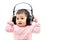 A baby girl listens music with headphone with hands