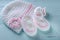 Baby girl nursery pink and white stripe wool booties and bonnet