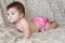 Baby girl in pink cloth diaper