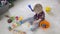 Baby girl placing colourful blocks in bowl. Game in room. 4K