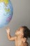 Baby Girl Playing With Inflatable Globe