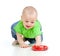 Baby girl playing with musical toy