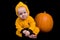 Baby Girl with a pumpkin