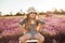 Baby girl sitting on top stepladder outdoors