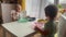 baby group eating at the table in kindergarten. happy family kid dream concept. baby twins learning to eat sitting at