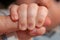 Baby Hand Holding Adult Parent Finger