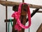 Baby headband pink polka dots hanging on wood