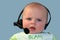 Baby with a headset