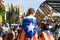 Baby held by his father and covered with catalan independentist flag during the rally at La Diada, Catalonia`s