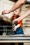 Baby helping unload dishwasher