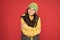 Baby its cold outside. Happy girl in warm wear red background. Child care and health. Winter child care. Treatment and
