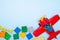 Baby kids toy frame. Top view multicolor cubes bricks and plane on blue background. Blocks flat lay. Copy spase for text