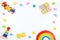 Baby kids toys background. Wooden educational geometric stacking blocks toy, wooden train, car, rainbow, airplane and