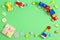 Baby kids toys background. Wooden educational geometric stacking blocks toy, wooden train, cars, stacking pyramid tower