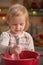 Baby kneading dough using whisk