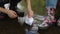 Baby with mom playing paper boat, slow motion