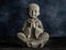 Baby monk praying statuette