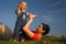 Baby, mother, grass and sky