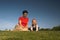 Baby, mother, grass and sky