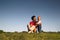 Baby, mother, grass and sky