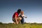 Baby, mother, grass and sky