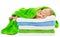 Baby newborn sleeping wrapped in bath towels