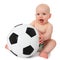 Baby next to soccer ball