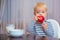 Baby nutrition. Eat healthy. Toddler having snack. Healthy nutrition. Vitamin concept. Child eat apple. Kid cute boy sit