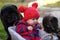 Baby outdoors with pugs