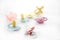 Baby pacifier set over white background