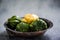 Baby pattypan in rustic bowl