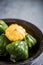 Baby pattypan in rustic bowl